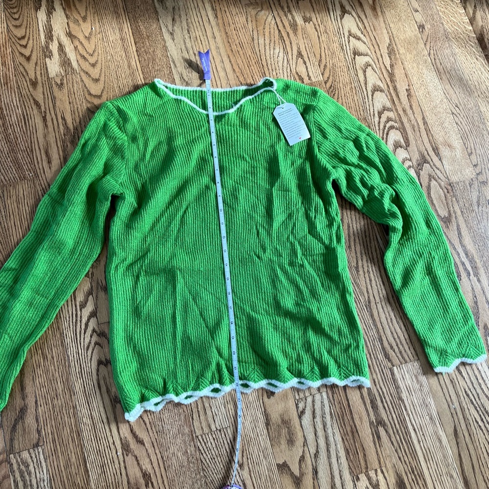 Green cozy sweater with white trim size small